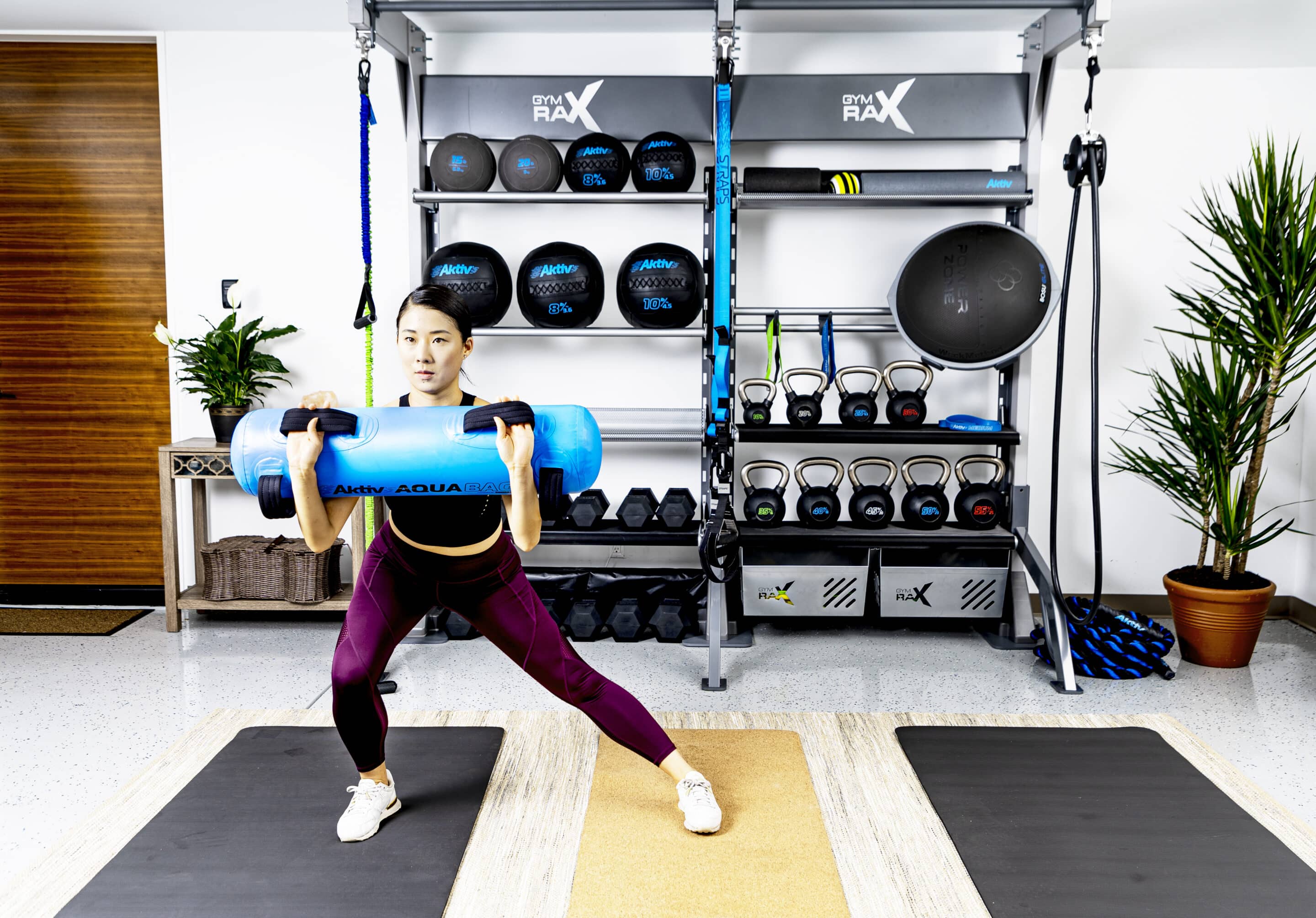 Female working out in their home gym. 