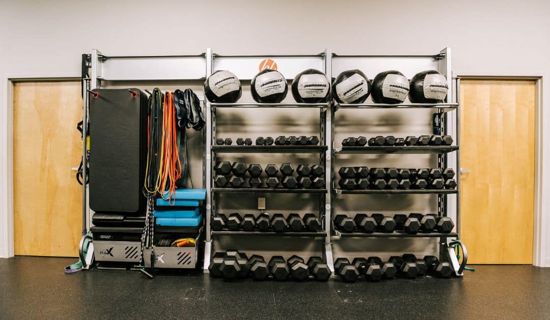 Boutique gym studio with functional storage to optimize the space.