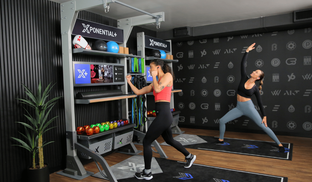 Hotel gym designed with digital exercise guidance. 