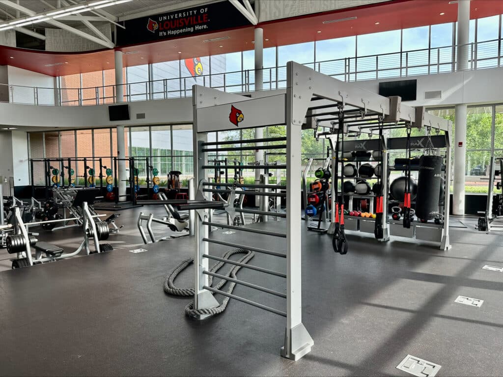 Branded Gym Rax bridge with accessories in University of Louisville Rec Center.